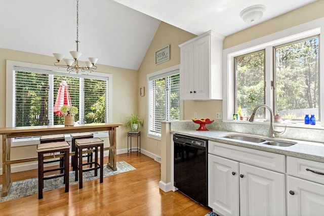 kitchen with sink, decorative light fixtures, dishwasher, a chandelier, and white cabinetry