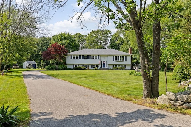 382 Tilden Rd, Scituate, MA 02066 - raised ranch with a chimney and a front yard