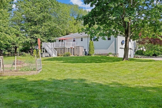 382 Tilden Rd, Scituate, MA 02066 - view of green lawn with stairs and a wooden deck