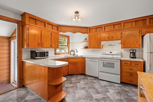 58 Spring St, Wakefield, MA 01880 - kitchen with open shelves, white appliances, under cabinet range hood, a sink, and tasteful backsplash