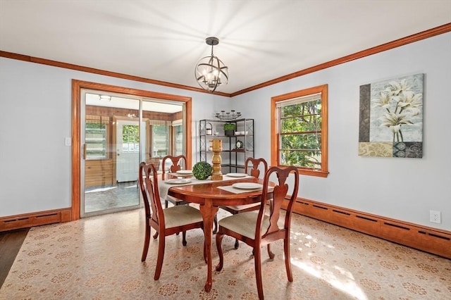 58 Spring St, Wakefield, MA 01880 - dining space with a baseboard radiator, crown molding, a chandelier, and baseboards