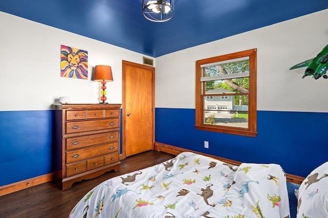 58 Spring St, Wakefield, MA 01880 - bedroom with baseboards and dark wood finished floors