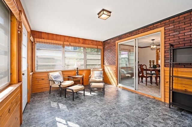 58 Spring St, Wakefield, MA 01880 - sunroom / solarium featuring wooden walls and brick wall