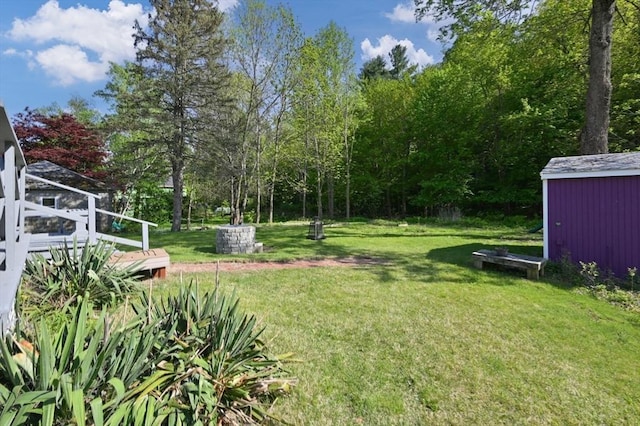 58 Spring St, Wakefield, MA 01880 - view of grassy yard featuring an outbuilding