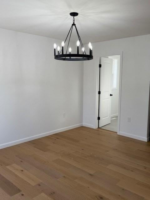 unfurnished dining area featuring hardwood / wood-style floors