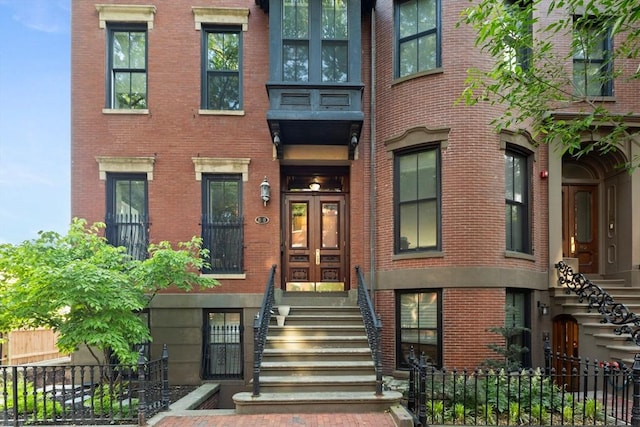 80 Worcester St Unit A, Boston, MA 02118 - view of front facade with brick siding and stairs