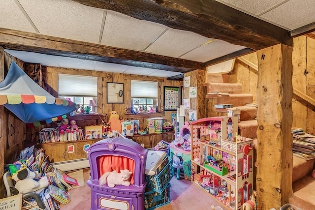 7 Mount Dustin Ave, Haverhill, MA 01832 - game room with wooden walls, a baseboard radiator, beamed ceiling, carpet flooring, and a wall mounted air conditioner
