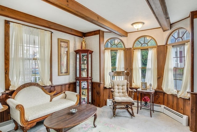 7 Mount Dustin Ave, Haverhill, MA 01832 - sitting room with carpet, beam ceiling, a wainscoted wall, wooden walls, and a baseboard radiator
