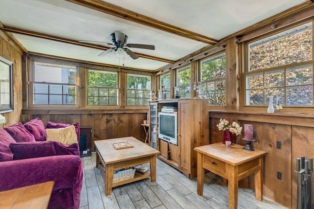 7 Mount Dustin Ave, Haverhill, MA 01832 - sunroom / solarium with healthy amount of natural light, wooden walls, a deck, beam ceiling, and wood finished floors