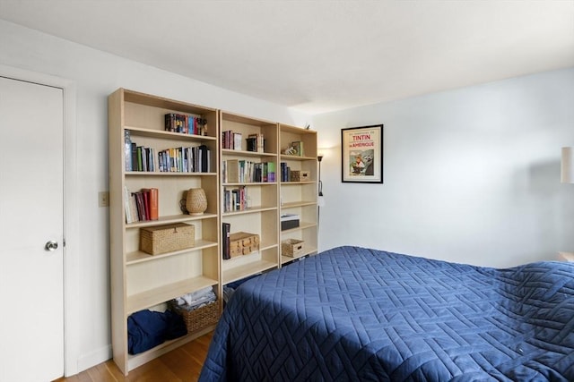 51 Warren St Unit 2-2, Waltham, MA 02453 - bedroom with wood finished floors