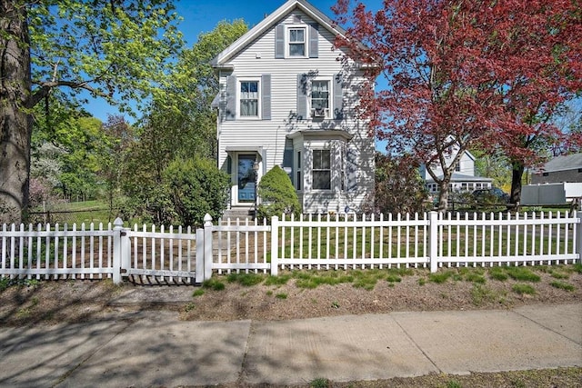 view of front of property with a fenced front yard