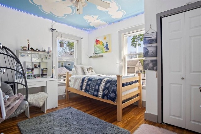 bedroom with wood finished floors