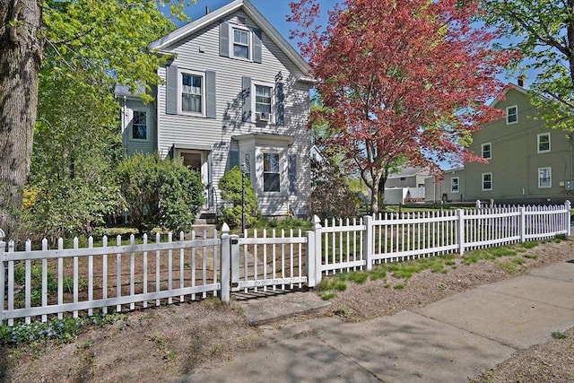 61 Mishawum Rd, Woburn, MA 01801 - traditional home featuring a fenced front yard