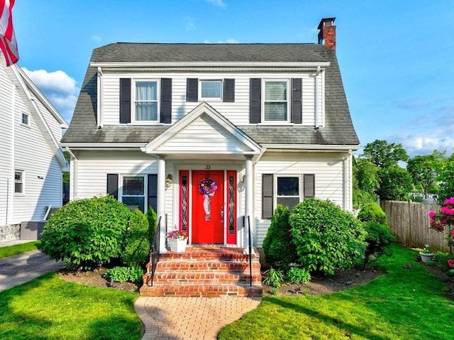 33 Samoset Ave, Quincy, MA 02169 - dutch colonial featuring a chimney and roof with shingles