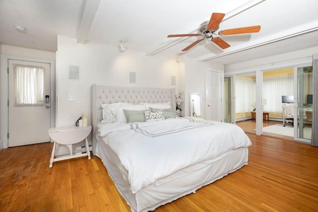 33 Samoset Ave, Quincy, MA 02169 - bedroom with light wood-type flooring, beamed ceiling, and a ceiling fan