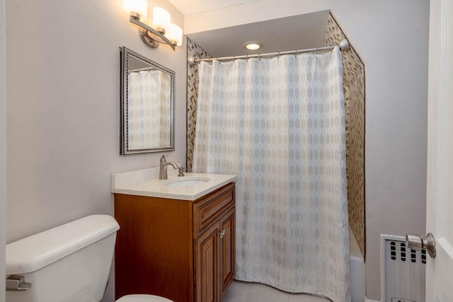 33 Samoset Ave, Quincy, MA 02169 - bathroom featuring radiator, vanity, toilet, shower / bath combo with shower curtain, and tile patterned flooring
