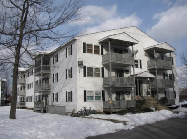 30 Abbey Rd Unit 108, Leominster, MA 01453 - snow covered building featuring a view of apartment building / complex