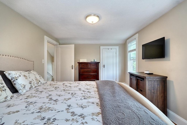 215 Curve, Dedham, MA 02026 - bedroom with baseboards and a closet