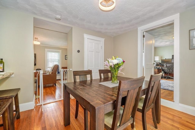 215 Curve, Dedham, MA 02026 - dining room featuring light wood-type flooring, baseboards, and an office area