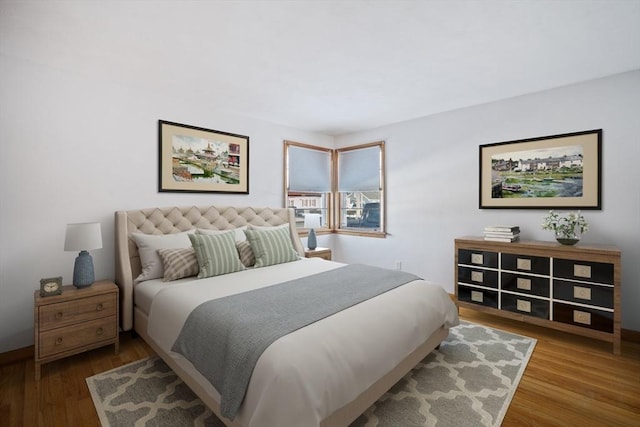 bedroom featuring hardwood / wood-style floors