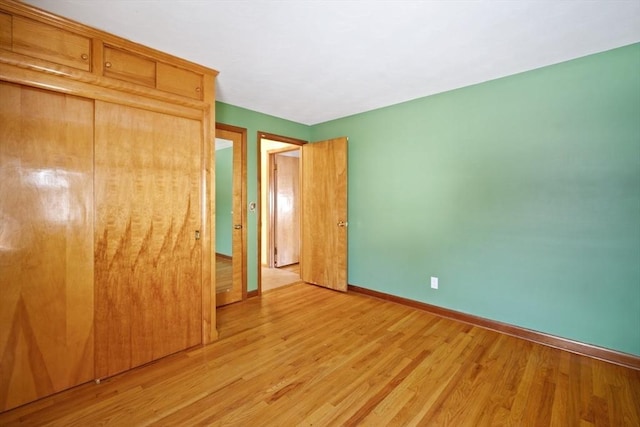 unfurnished bedroom featuring light hardwood / wood-style floors