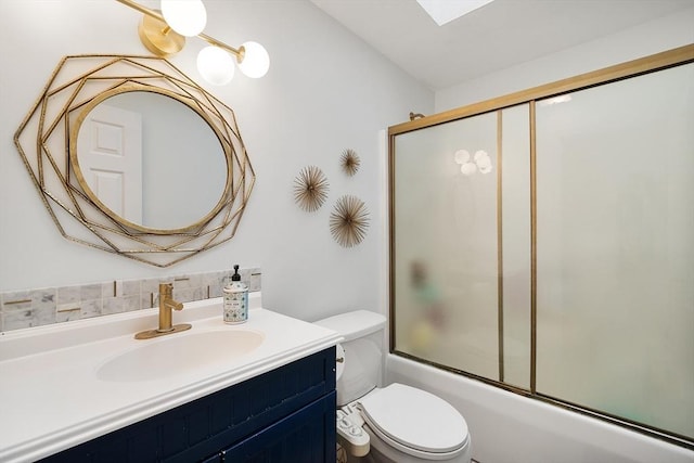 2 Pinebrook Ln, Worcester, MA 01609 - bathroom with vanity, toilet, combined bath / shower with glass door, and a skylight