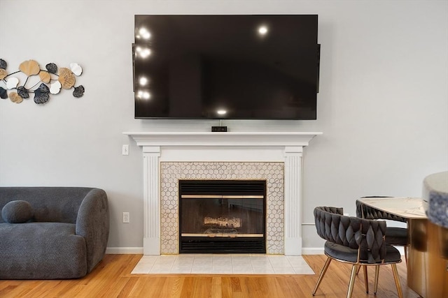 2 Pinebrook Ln, Worcester, MA 01609 - detailed view of wood finished floors, a fireplace, and baseboards