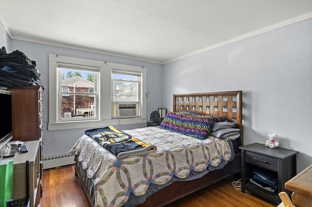 20 King St, Wilmington, MA 01887 - bedroom with baseboard heating, cooling unit, wood finished floors, and crown molding