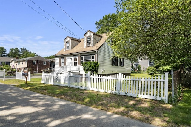 20 King St, Wilmington, MA 01887 - cape cod-style house featuring a fenced front yard