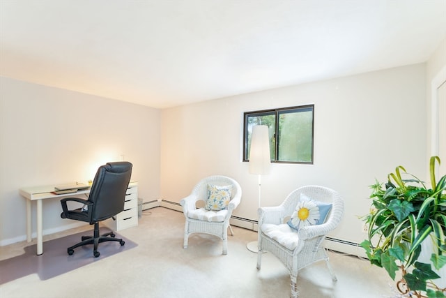 office space featuring light carpet and baseboard heating