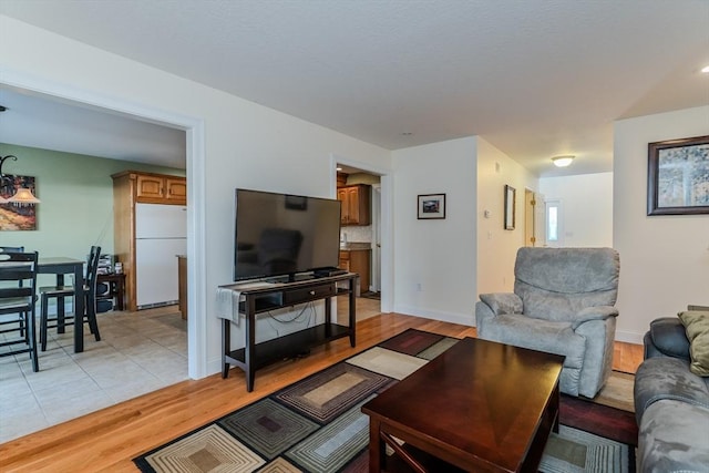 living room with light hardwood / wood-style floors