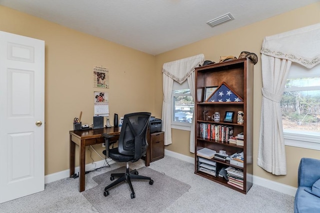 home office featuring light carpet