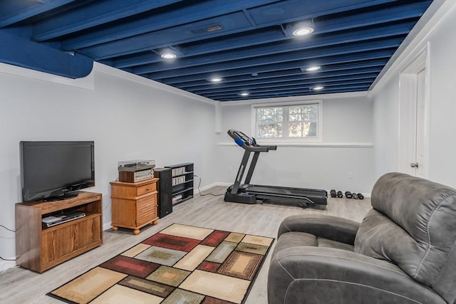 exercise area featuring light wood-type flooring