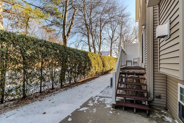 view of yard layered in snow