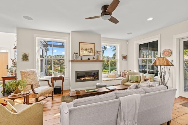 living room featuring ceiling fan