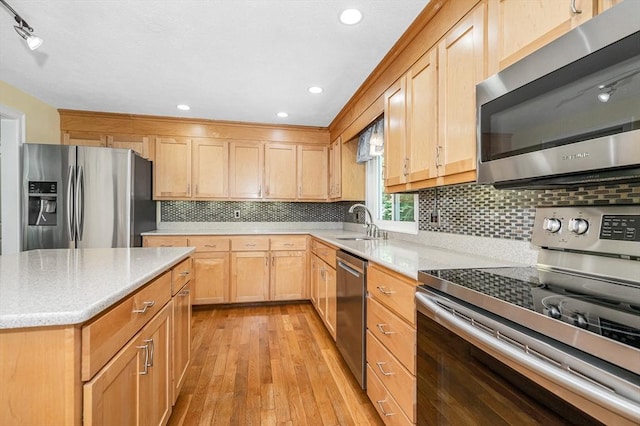 10 Shea Cir, Burlington, MA 01803 - kitchen featuring appliances with stainless steel finishes, light wood-type flooring, tasteful backsplash, light brown cabinetry, and recessed lighting