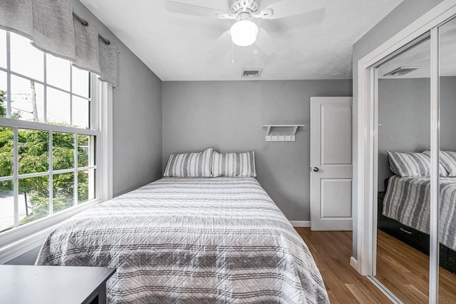 10 Shea Cir, Burlington, MA 01803 - bedroom featuring wood finished floors, a ceiling fan, and a closet