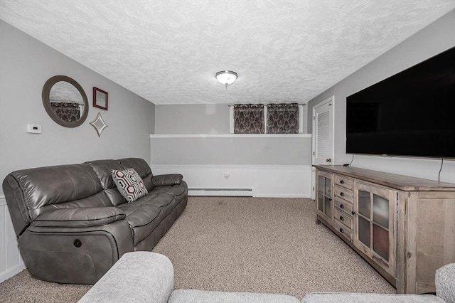 10 Shea Cir, Burlington, MA 01803 - living room featuring baseboard heating, a textured ceiling, light colored carpet, and wainscoting