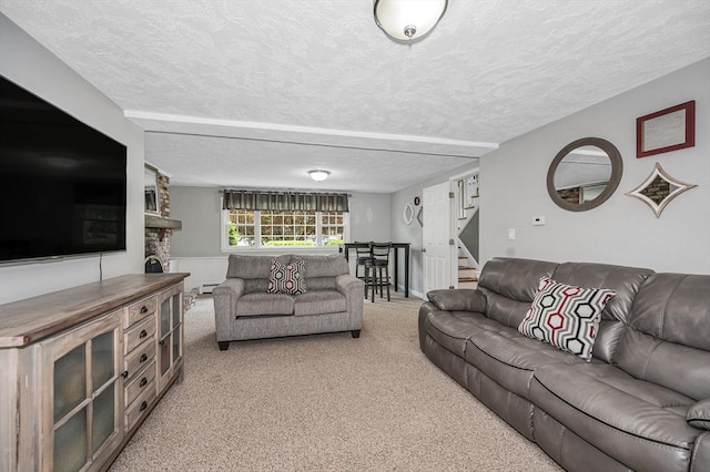 10 Shea Cir, Burlington, MA 01803 - living area featuring stairway, light colored carpet, a textured ceiling, and baseboard heating