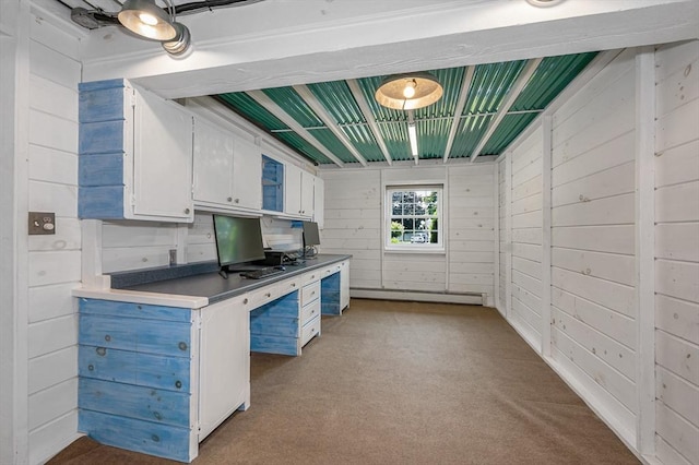 10 Shea Cir, Burlington, MA 01803 - kitchen featuring white cabinets, carpet, a baseboard radiator, and wooden walls