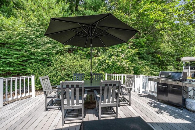 10 Shea Cir, Burlington, MA 01803 - wooden terrace featuring outdoor dining area and a grill