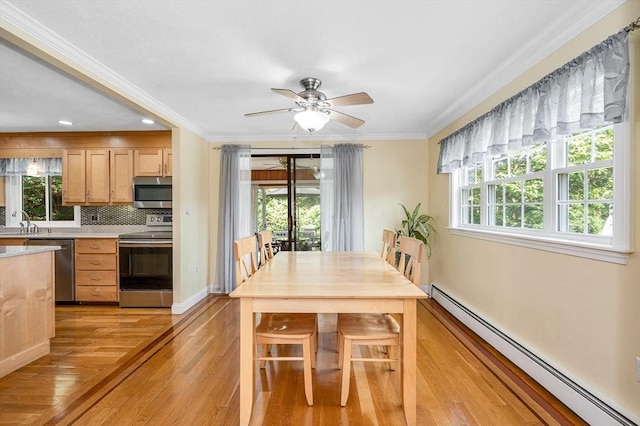 10 Shea Cir, Burlington, MA 01803 - dining space featuring baseboard heating, light wood finished floors, a ceiling fan, ornamental molding, and recessed lighting