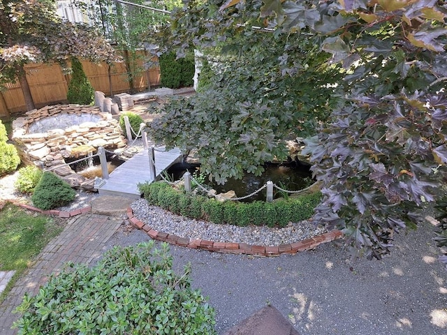 view of yard featuring a dock