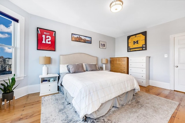 bedroom featuring hardwood / wood-style floors