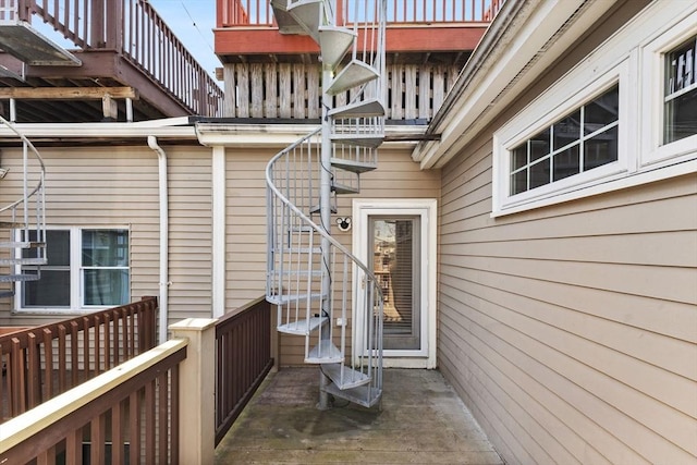 entrance to property featuring a deck
