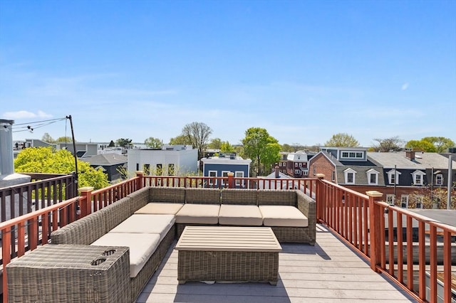wooden deck featuring outdoor lounge area and a residential view