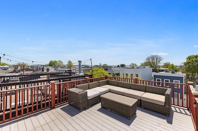 deck featuring an outdoor living space