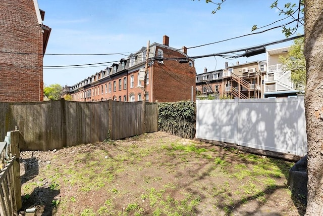 view of yard featuring fence