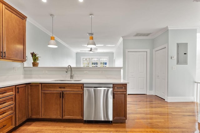 kitchen with stainless steel dishwasher, a peninsula, brown cabinets, electric panel, and a sink