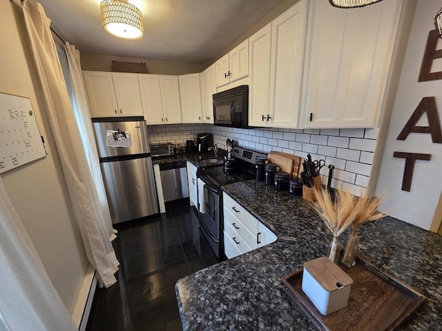 kitchen featuring stainless steel appliances, backsplash, white cabinets, dark stone counters, and dark tile patterned floors